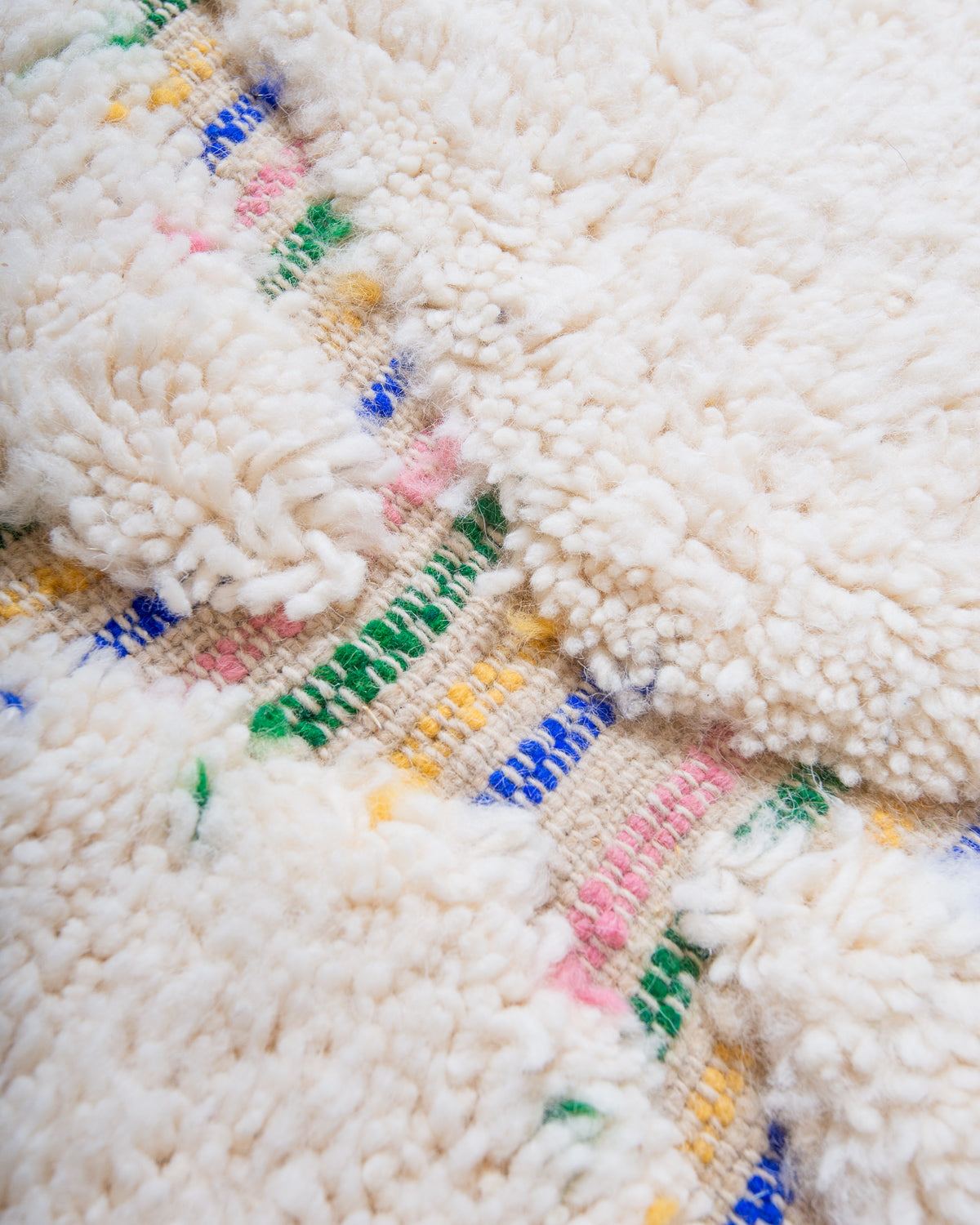 Modern, designer, handcrafted Berber rug from Morocco. Beniourain carpet with beautiful colours and patterns and fluffy wool texture.